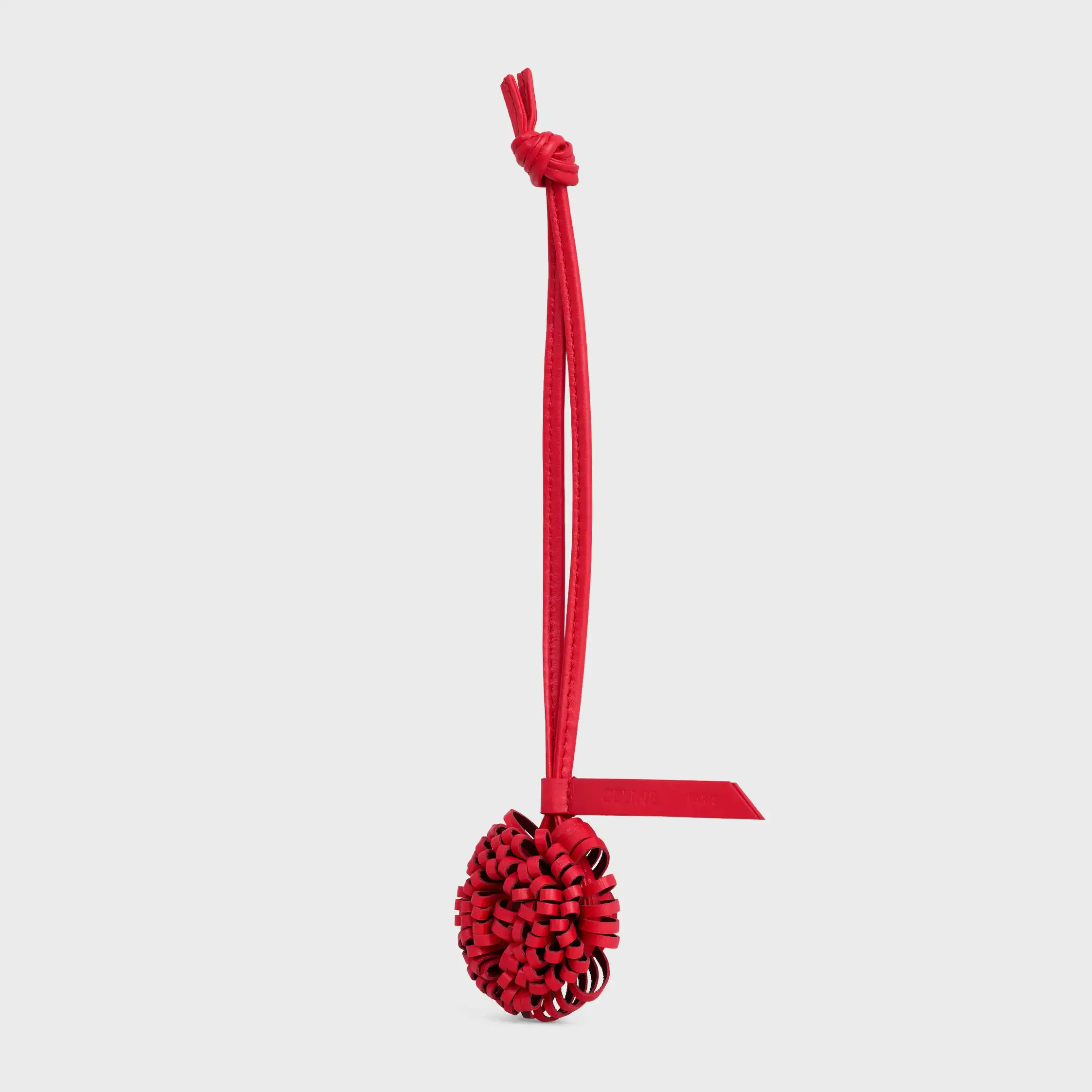 CHARM DE DENTE DE LEÃO EM PELE DE CORDEIRO LISÍSSIMA