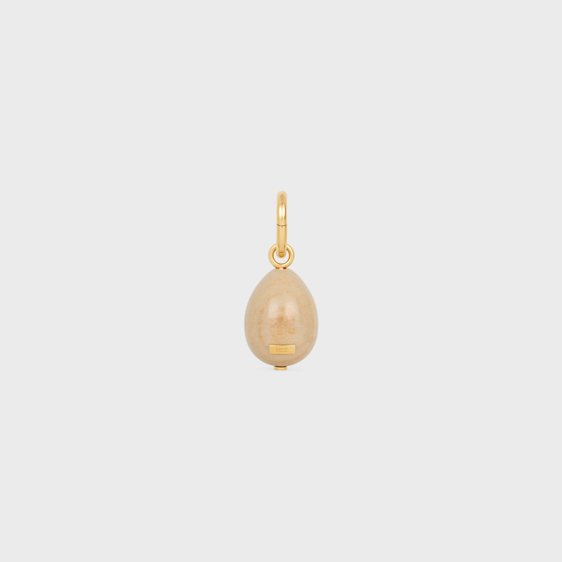 CHARM OVO EM BOTTICINO E LATÃO COM ACABAMENTO DOURADO