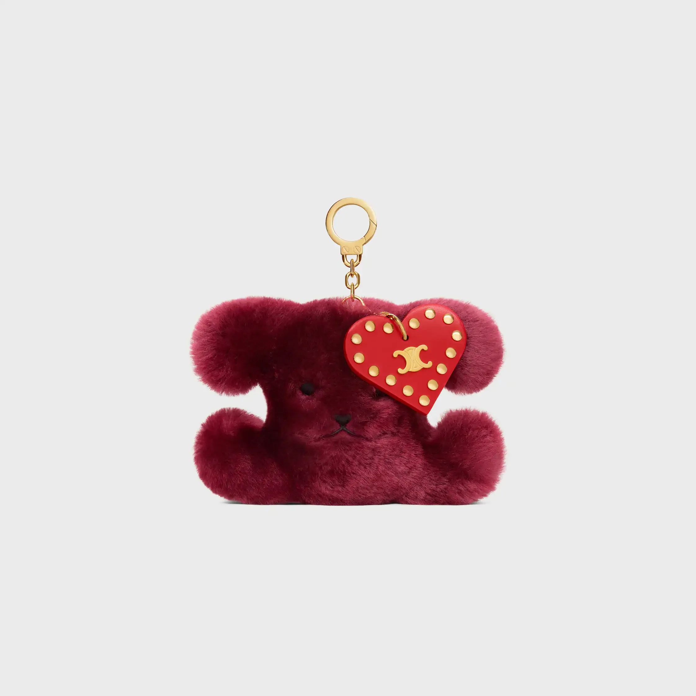 CHARM POM-POM TRIOMPHE EM PELÚCIA E COU DE VACAS