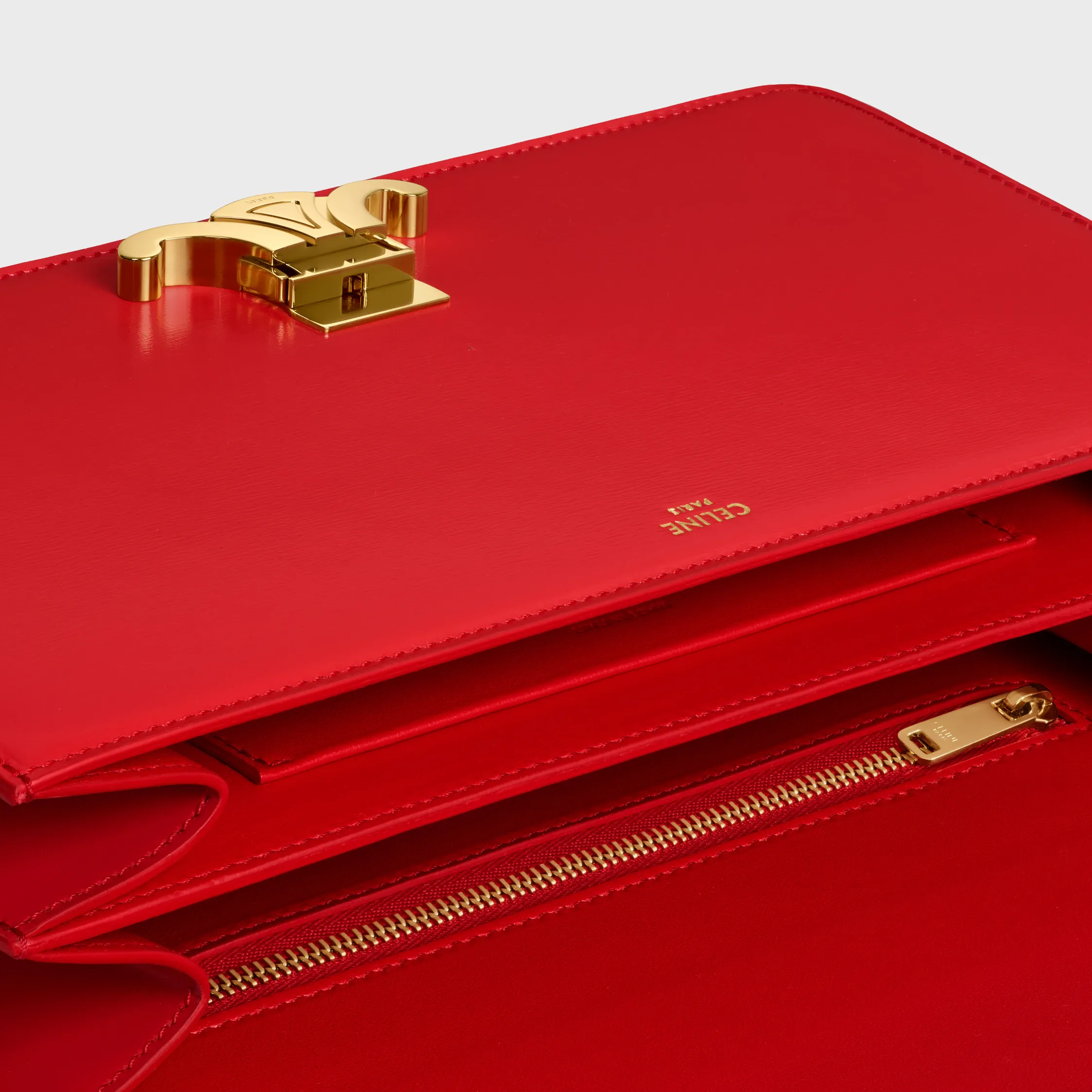MEDIUM TRIOMPHE FOLIO EM COURO DE VACA BRILHANTE