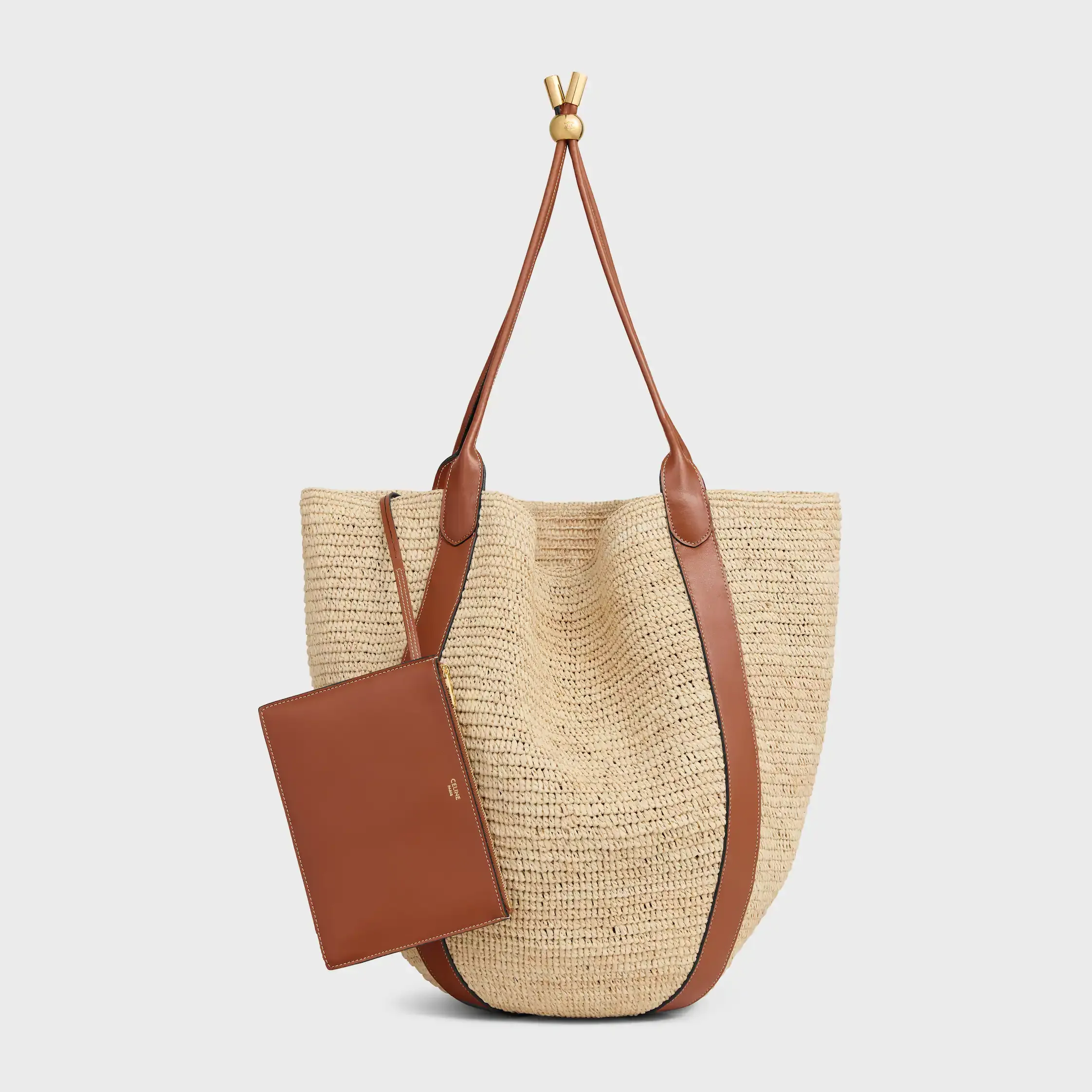 BOLSA BUCKET GRANDE EM RATTAN E COU DE VACA